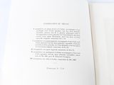 an open book that has a picture of a cat on it