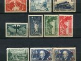 a collection of stamps from different countries on a black background