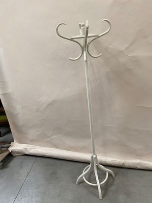 an image of a white coat stand with a coat rack