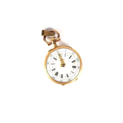 une montre de poche en or avec des chiffres romains