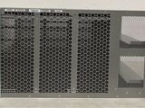 a close up of a metal rack with a bunch of wires on it