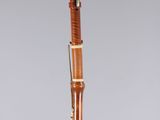 an image of a musical instrument that is on a clear surface