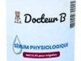 gros plan d'une bouteille de liquide sur fond blanc