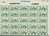 un gros plan d'un timbre sur lequel figurent des chevaux