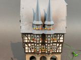a small model of a building with a lot of windows
