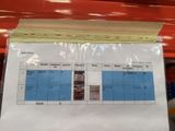 a picture of a picture of a price sheet on a shelf