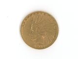 une pièce d'or sur laquelle est représentée une tête d'Indien