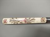 an image of a baseball bat with a floral design on it