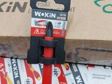 a red tool that is on top of a pile of boxes