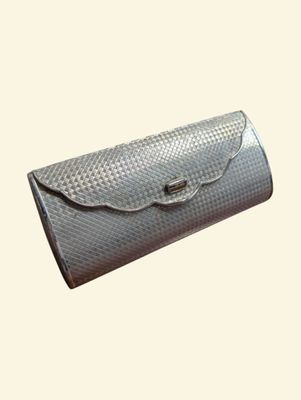 wallet case made of woven leather with a metal clasp