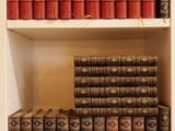 many books on the shelves in the room
