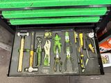 many different tools in a tool box on the floor