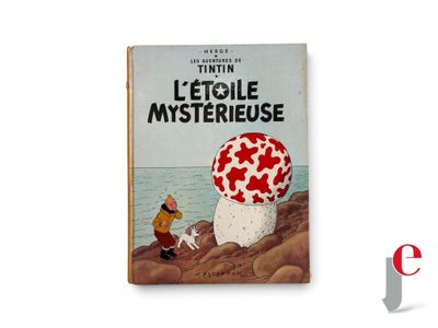 an old book with a picture of a mushroom on the cover