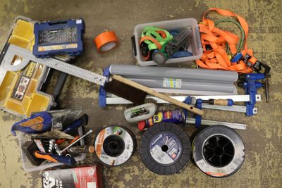 a lot of tools that are on the floor