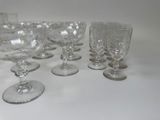 a lot of empty wine glasses sitting on a table