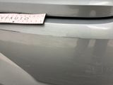 a sticker on the bumper of a car that has a sticker attached to it