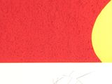 a picture of a red and yellow background with a yellow circle