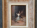 une vieille photo représentant une femme en robe bleue et un homme en chemise blanche