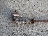 a rusted fire hydrant that is on the ground