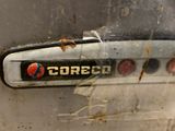 a close up of a broken gas stove with rust on it