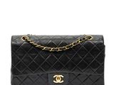 a chanel black quilted lambskin shoulder bag with gold hardware