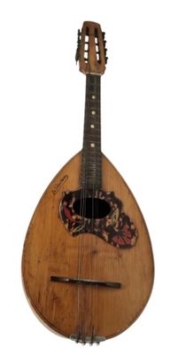 une image représentant une mandoline posée sur un support