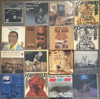 a lot of records on the wall of a room