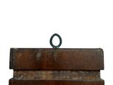 a wooden box with a ring on top of it