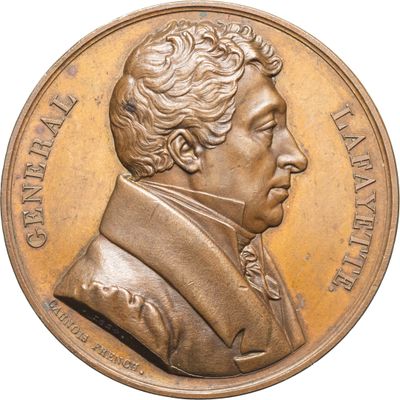 une image d'une médaille de bronze représentant un homme en costume-cravate