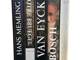 three books that are sitting on top of each other