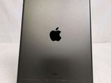 an apple ipad is sitting on a table with a white background