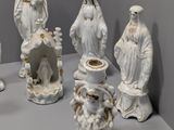 many figurines that are sitting on a table