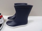 two pairs of shoes that are on a table