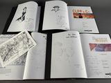 a book with a bunch of drawings on it