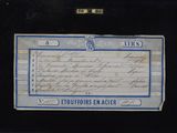 an old document with a blue border on the front of it