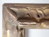 a close up of a metal sculpture of a person