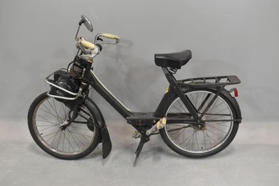 a black bicycle with a basket on the back of it