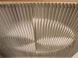 a picture of a ceiling fan that is hanging from the ceiling