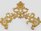 pair of antique gold leaf and flower wall sconces on a white background