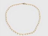 a gold beaded necklace with pearls on a white background