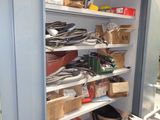 a shelf full of assorted items in a room