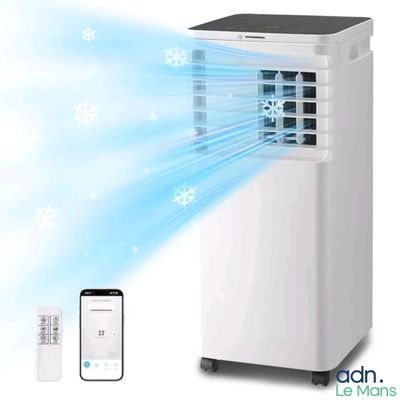 an image of a white air conditioner sitting next to a remote control