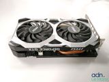 a close up of a video card with two fans on top of it
