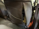 an image of a car with the back seat open