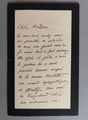 une vieille lettre manuscrite sur une feuille de papier comportant des inscriptions