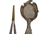 an image of a mirror and a pair of scissors on a white background