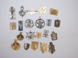 many different types of badges on the wall