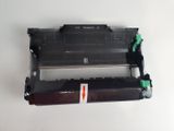 a close up of a black printer unit with a red arrow pointing to it