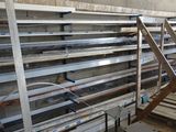 many shelves that are in the middle of a room