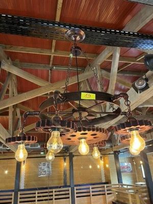 a large chandelier that has a lot of lights hanging from it